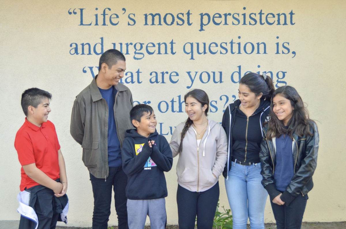 The Big Brothers Big Sisters of Orange County offers high school students a chance to serve as mentors to local elementary school children. Because of confidentiality issues, the organization cannot share images of the youth whom Sunny Hills students worked with. Instead, it provided the following stock image of Tustin High School mentors standing outside of a campus in 2019.